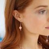 flamant drama earrings short